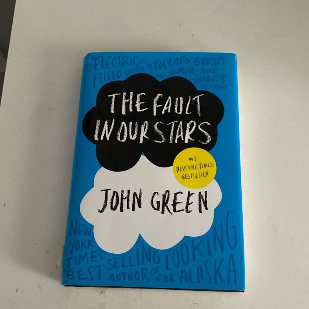 Hard back of John Green’s “A fault in Our Stars”